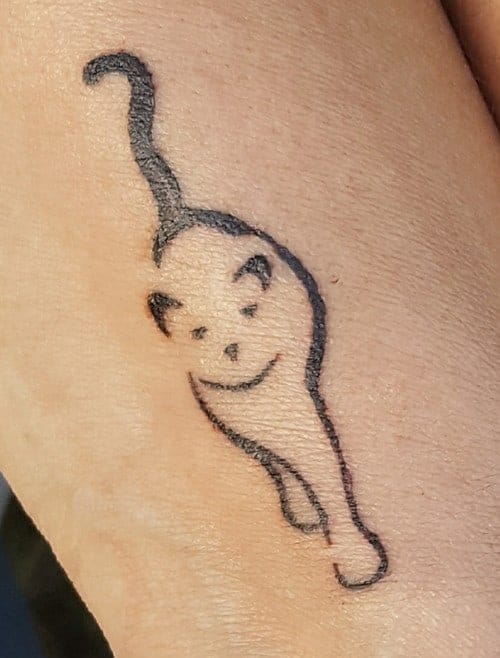disegno gattino stilizzato tatuaggio